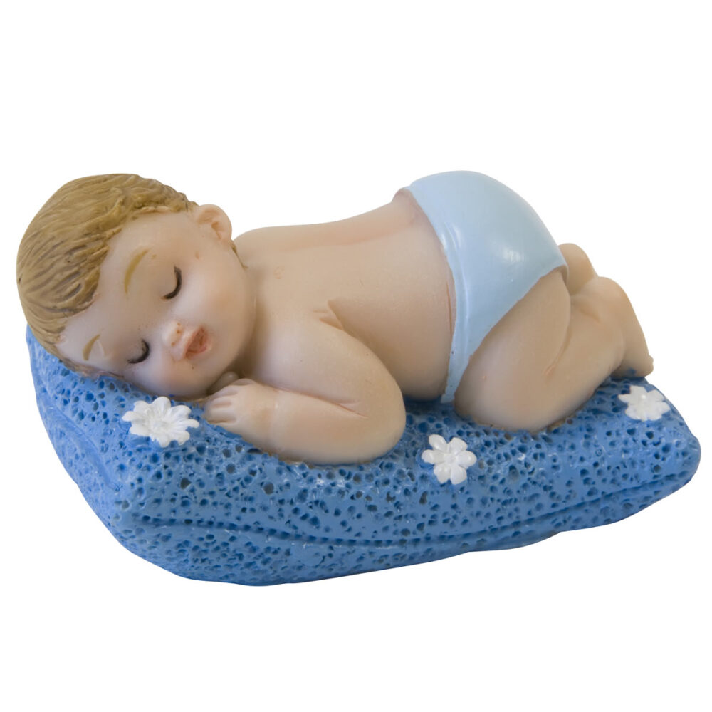 PETIT GARCON ENDORMI SUR COUSSIN