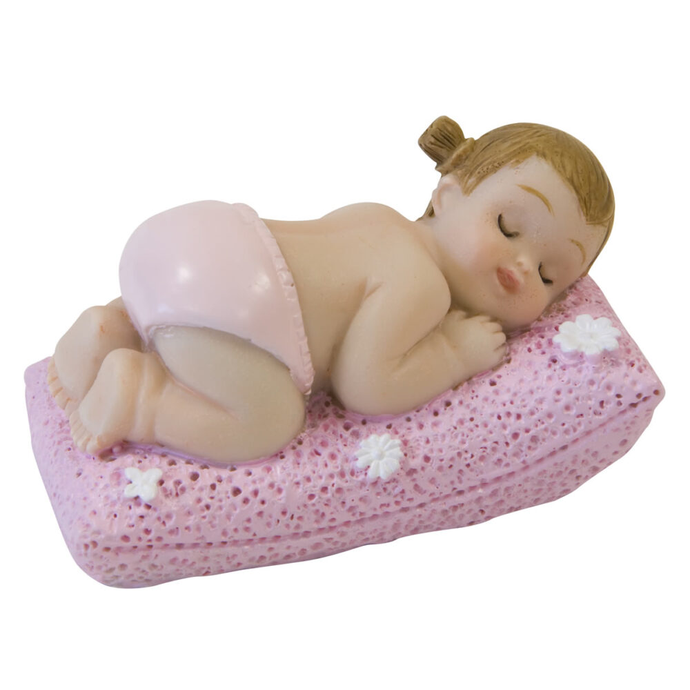 PETITE FILLE ENDORMIE SUR COUSSIN